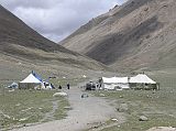 Tibet Kailash 08 Kora 17 Lunch Stop At Tamdrin Outside We walked for about 105 minutes from Chuku bridge to Tamdrin (Hayagriva), our lunch stop in a set of seasonal tents, serving basic instant noodles-type food and various drinks.